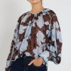 Stories be Told Cosmopolitan Chocolate Blue Floral Crew Neck Floaty LS Top