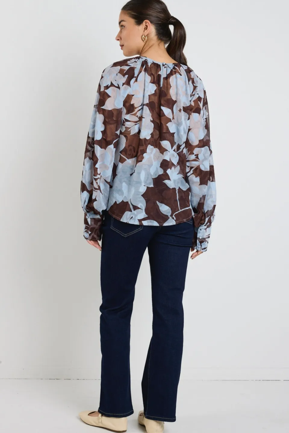 Stories be Told Cosmopolitan Chocolate Blue Floral Crew Neck Floaty LS Top