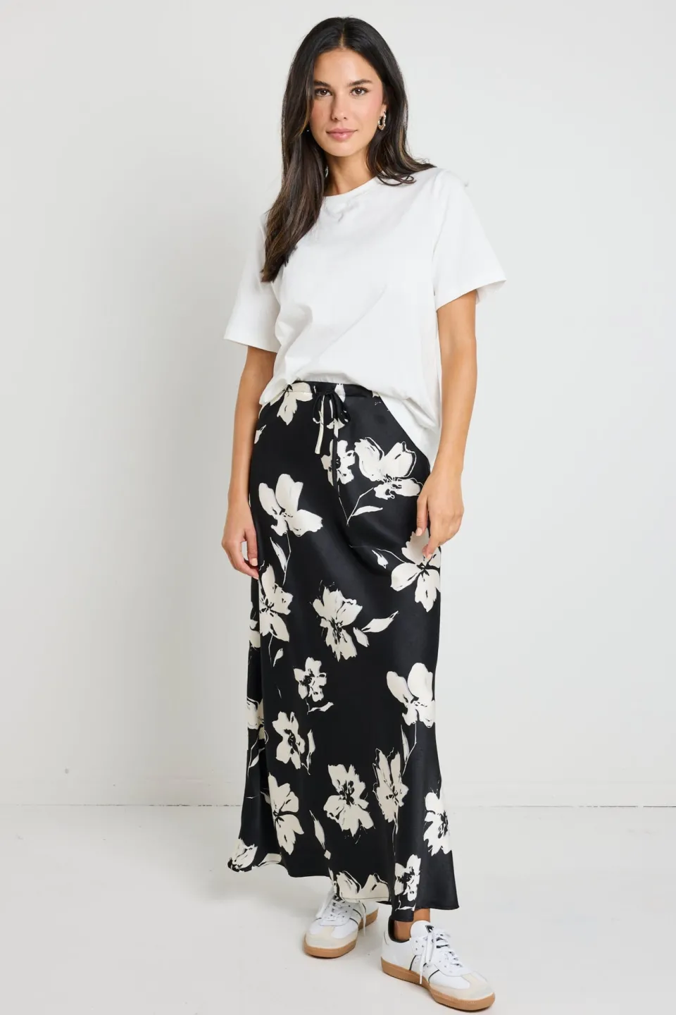 Stories be Told Critical Black Floral Satin Tie Waist Bias Maxi Skirt