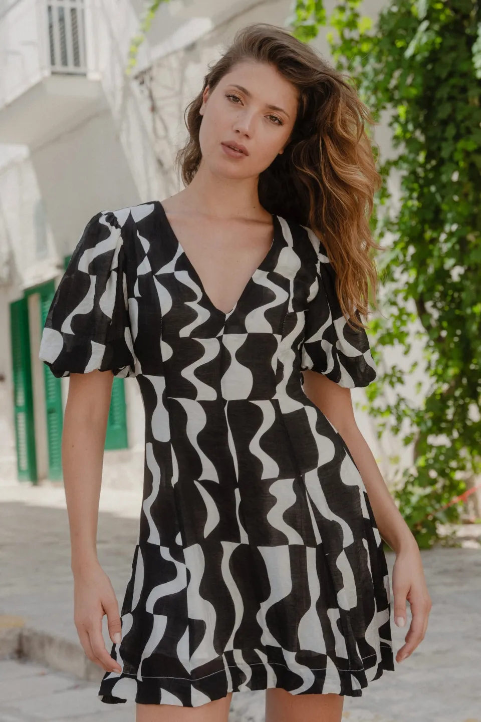 Stories be Told Sicily Black Wave Print Short Sleeve Mini Dress