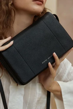Status Anxiety Succumb Shoulder Bag Black Fold Over Side Studs